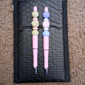 One of kind custom beadable pens.